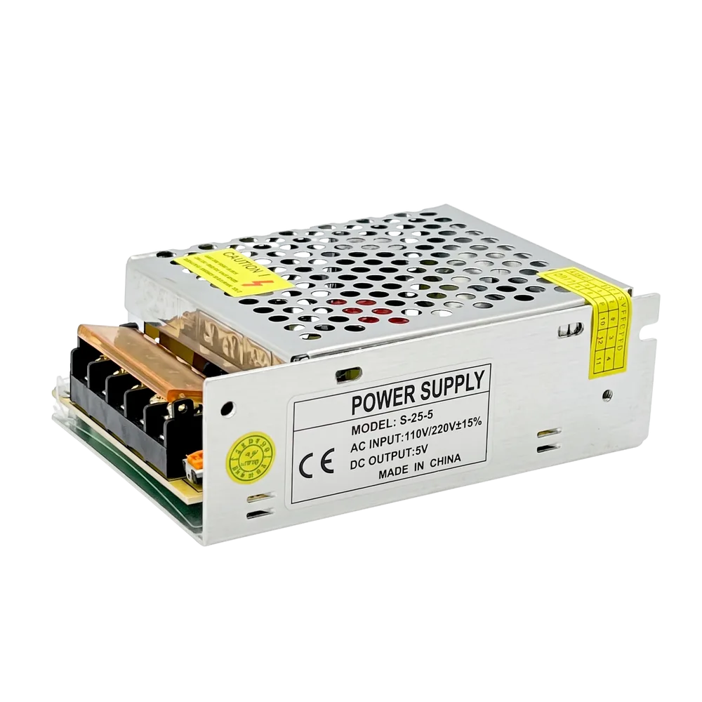 The 5 V high-power supply: a perforated metal case with a screw terminal block.